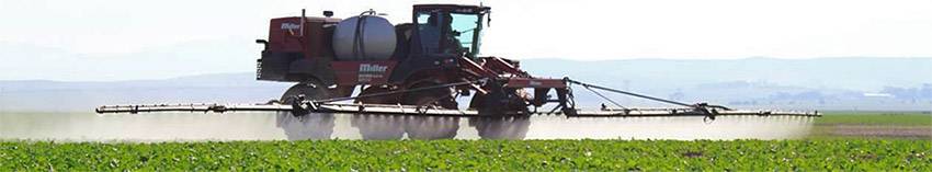 Image of field being sprayed with herbicide